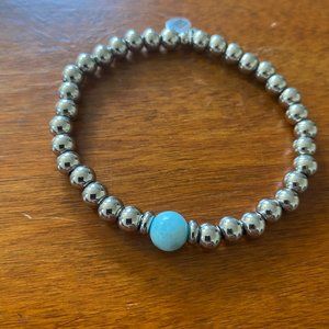 Stainless beaded bracelet with blue accent bead